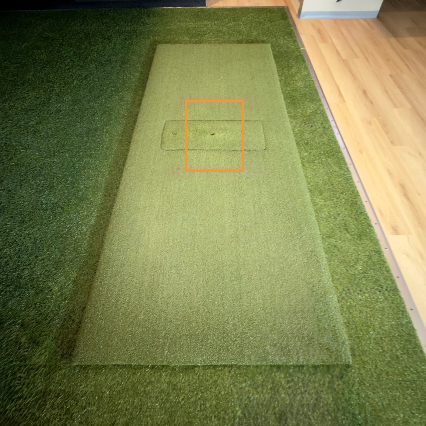 Player view of the mat with the hitting area outlined in orange