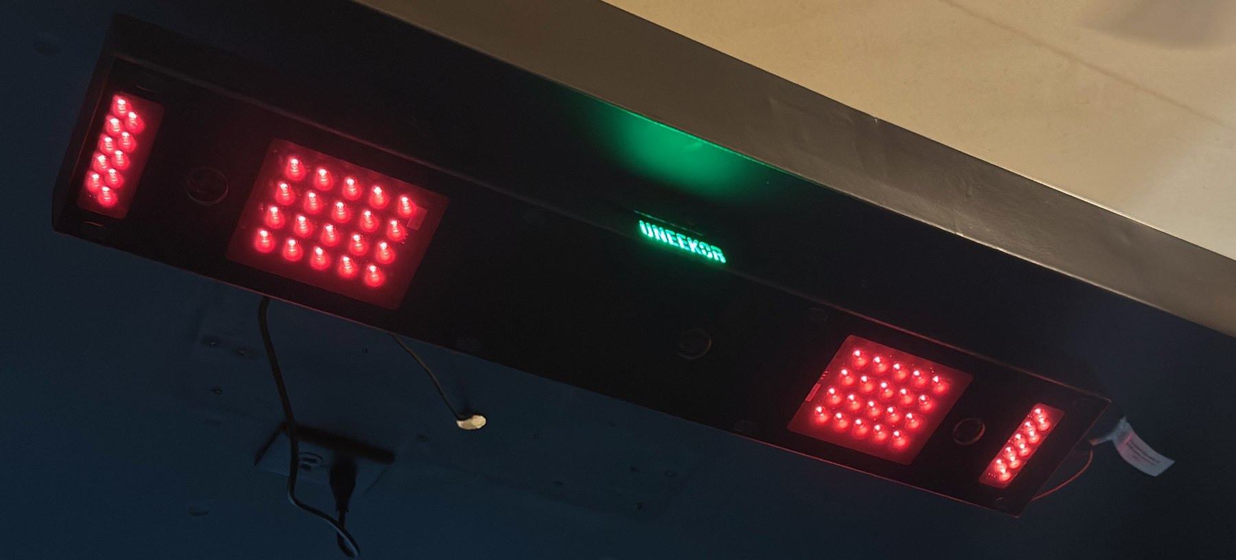 Uneekor logo glowing green